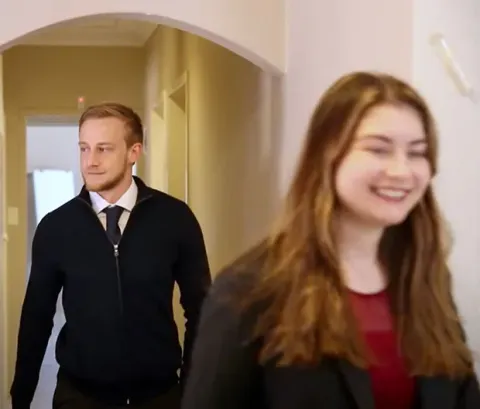 A psychology graduate working as an Education Leader
